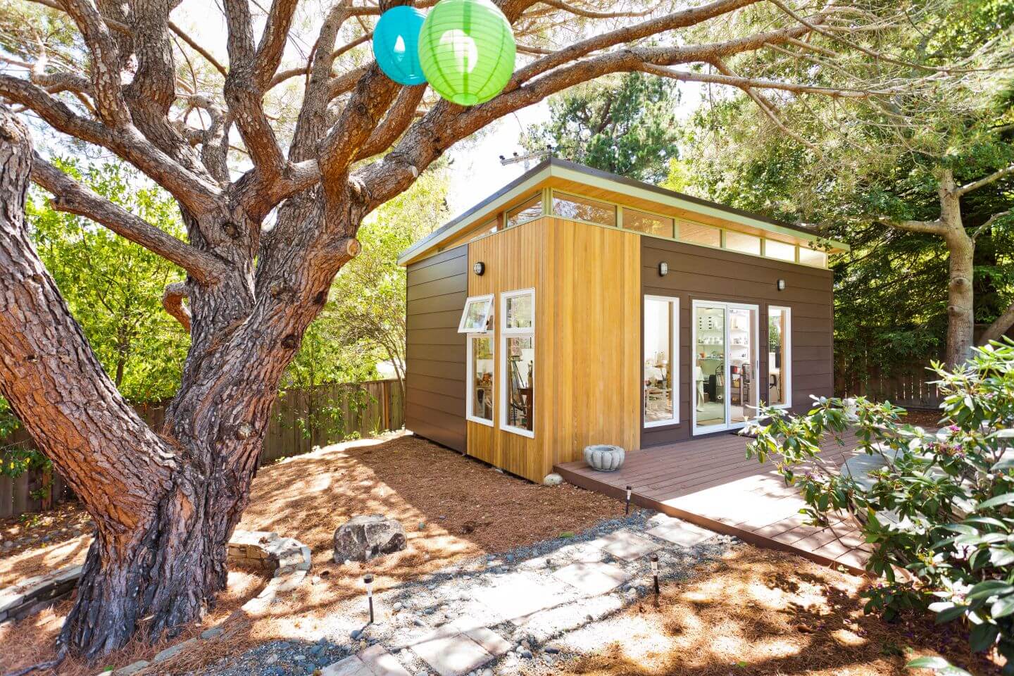 Modern prefab backyard shed with wood siding