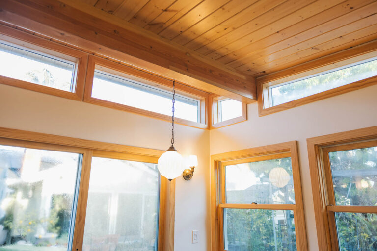 Interior shed corner with clerestory windows and wood ceiling
